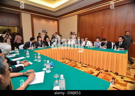 Kuala Lumpur, Malaysia. 10th Mar, 2014. A delegation of the Public Security Ministry of China and delegates of Malaysian Transport Ministry attend a meeting on the missing Malaysian Airlines flight issue in Kuala Lumpur, capital of Malaysia, March 10, 2014. Credit:  Chong Voon Chung/Xinhua/Alamy Live News Stock Photo