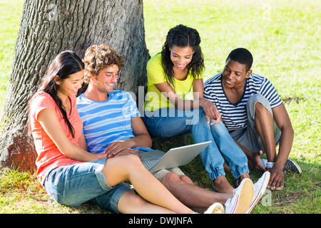 Students using laptop on college campus Stock Photo