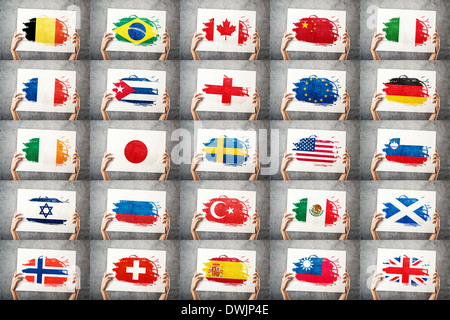 Various national flags collection. Man holding banner with grunge Flag. Supporting national team, patriotism concept. Stock Photo