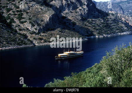 Halas, a renovated steam boat, and now a small luxury cruise boat off the Turquoise Coast in Turkey, near Gocek. Stock Photo