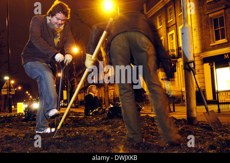 members of guerrilla gardening organisation in action southwark london se1 richard reynolds [founder] 28,anne slater 60,zoe 28 c Stock Photo