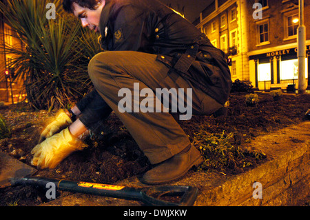 members of guerrilla gardening organisation in action southwark london se1 richard reynolds [founder] 28,anne slater 60,zoe 28 c Stock Photo