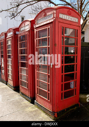 Row of old red telephone boxes, Truro, Cornwall, UK Stock Photo