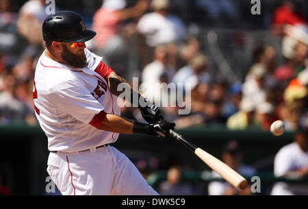 Shirtless Mike Napoli celebrates with helmeted Jonny Gomes 