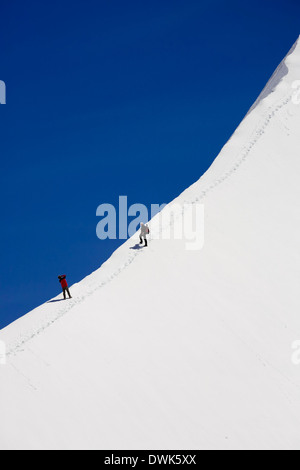 Climbers on the north-west ridge of the Trugberg from Obers Mönchjoch, Jungfrau-Aletsch, Switzerland Stock Photo