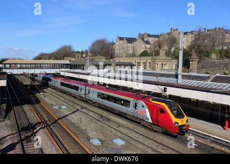 Virgin voyager 221 114 arriving at Lancaster railway station with a southbound service along the West Coast mainline.. Stock Photo