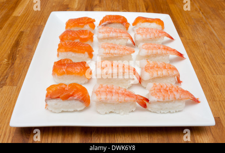 A dish of homemade nigiri sushi, ready to eat. Stock Photo