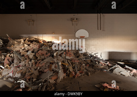 Dry wall and other debris inside the gymnasium of the Harvest Bible Chapel undegoing demolition in Oakville, Ontario, Canada. Stock Photo