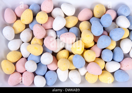 Hard shelled covered chocolate centered pastel candy eggs Stock Photo