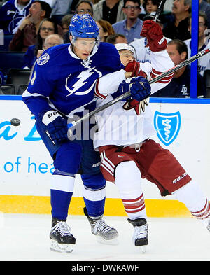 Tampa, Florida, USA. 10th Mar, 2014. DIRK SHADD | Times .Tampa Bay Lightning defenseman Keith Aulie (3) battles for the puck against Phoenix Coyotes center Jeff Halpern (14) during second period action at the Tampa Bay Times Forum in Tampa Monday evening (03/10/14) © Dirk Shadd/Tampa Bay Times/ZUMAPRESS.com/Alamy Live News Stock Photo