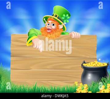 St Patricks day leprechaun background with wooden sign and cauldron or pot of gold coins Stock Photo