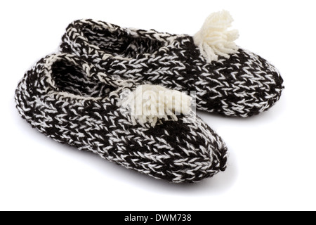 Pair of handmade knitted slippers isolated on white Stock Photo