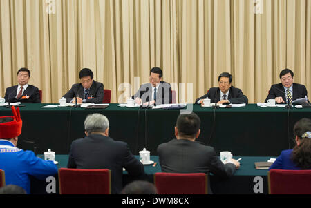 (140311) -- BEIJING, March 11, 2014 (Xinhua) -- Chinese Vice Premier Zhang Gaoli (C rear), also a member of the Standing Committee of the Political Bureau of the Communist Party of China Central Committee, joins a discussion with deputies to China's 12th National People's Congress (NPC) from central China's Hunan Province during the second session of the 12th NPC, in Beijing, capital of China, March 11, 2014. (Xinhua/Wang Ye) (zkr) Stock Photo