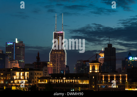 The skyline along the Bund in Shanghai, China, at sunset. Stock Photo