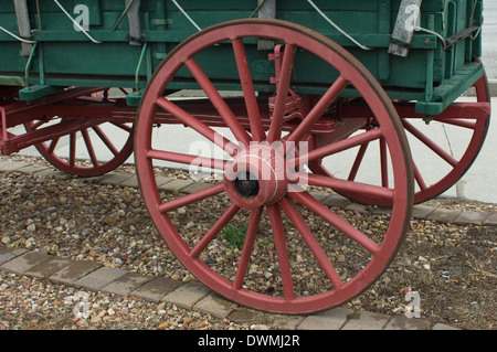 Wheel of a covered wagon replica on the Santa Fe Trail route, Council Grove, Kansas. Digital photograph Stock Photo