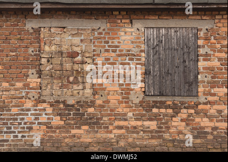 Security windows blocked up with quarter inch steel plate or bricked in to prevent light and break Stock Photo
