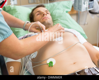 MAN WITH ECG HOLTER Stock Photo - Alamy