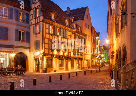 Twilight street scene in Colmar, Alsace, France Stock Photo