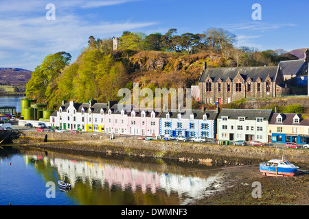Multi-coloured houses with reflections in Portree harbour, Isle of Skye, Inner Hebrides, Highlands and Islands, Scotland, UK Stock Photo