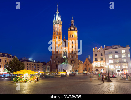 Rynek Glowny (Town Square) and St. Mary's Church, Old Town, UNESCO World Heritage Site, Krakow, Malopolska, Poland, Europe Stock Photo