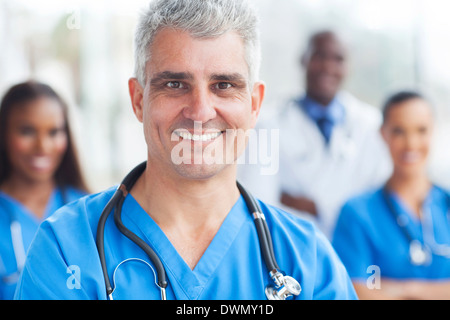 handsome senior medical surgeon portrait in hospital Stock Photo