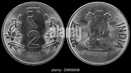 Two rupee coin of India isolated on black background. Map of India as a ...