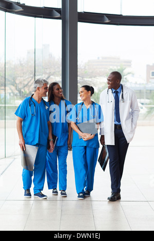 group of successful medical doctors walking in hospital Stock Photo