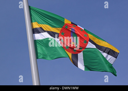 flag of Dominica over blue sky Stock Photo