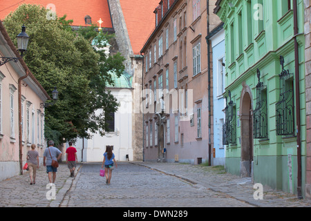 People walking along Kapitulska Street in Old Town, Bratislava, Slovakia, Europe Stock Photo