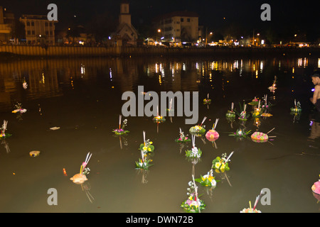 Offerings floating along river during Loi Krathong festival, Chiang Mai, Northern Thailand, Thailand, Southeast Asia, Asia Stock Photo