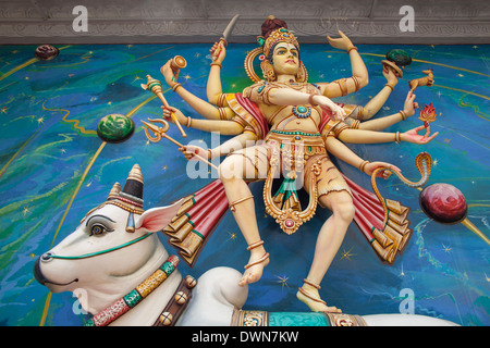 Nataraj Dancing Form of Lord Shiva Hindu God Standing on Sacred Cow on Temple Exterior Wall Stock Photo