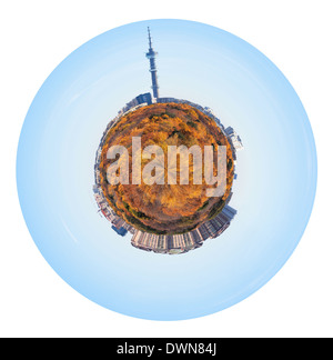little planet - little planet with yellow autumn forest and urban houses and TV tower isolated on white background Stock Photo