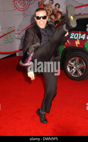 Hollywood, California, USA. 11th Mar, 2014. Actor RICKY GERVAIS clowns on the red carpet for the premiere of 'Muppets Most Wanted' at the El Capitan Theater. Credit:  Phil Roach/Globe Photos/ZUMAPRESS.com/Alamy Live News Stock Photo