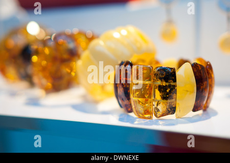 Shoot orange amber beads on bokeh background Stock Photo