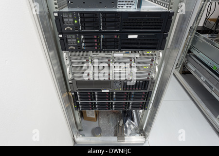 servers stack with hard drives in a datacenter for backup and data storage Stock Photo