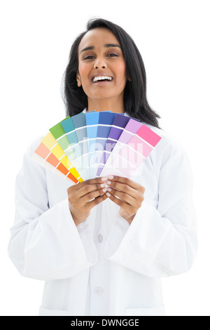 Portrait of a woman with paint samples Stock Photo