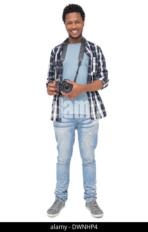 Portrait of a happy male photographer Stock Photo