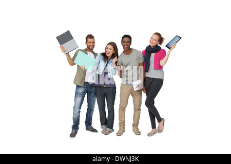 Casual young people with documents and digital table Stock Photo