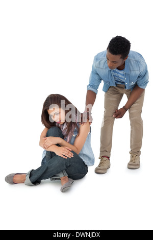 Full length of man supporting sad woman Stock Photo
