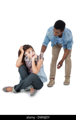 Young man supporting sad woman Stock Photo