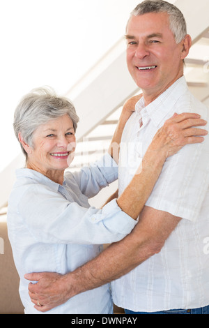 Affectionate senior couple dancing together Stock Photo