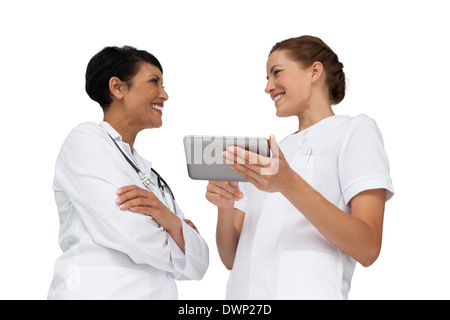 Two female doctors using digital tablet Stock Photo