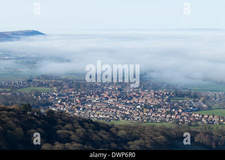 View over Great Ayton village from the summit of Roseberry Topping on misty morning. North York Moors National Park. UK Stock Photo