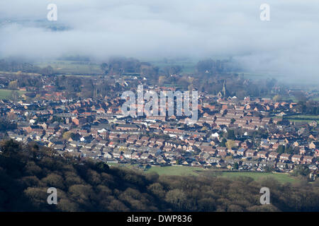 View over Great Ayton village from the summit of Roseberry Topping on misty morning. North York Moors National Park. UK Stock Photo