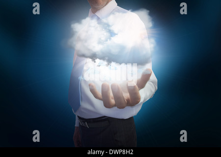 Businessman presenting cloud Stock Photo
