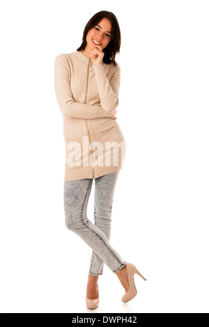 Beautiful young asian caucasian woman in sweater and jeans studio portrait isolated over white background Stock Photo