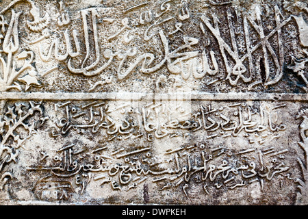 Islam, Arabic inscription on the wall Stock Photo