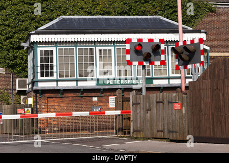 Petersfield 1880's Type 3 Signal Box with down full barrier type level crossing. Stock Photo