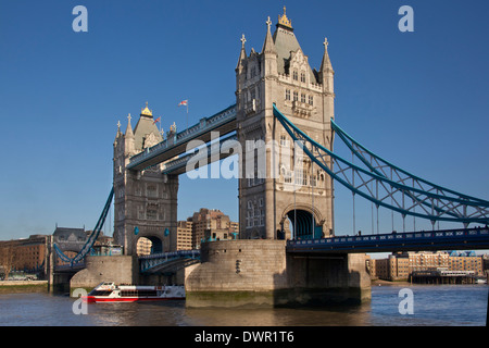 Tower Bridge (built 1886-1894) is a combined bascule and suspension bridge in London, England, over the River Thames Stock Photo