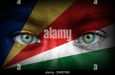 Human face painted with flag of Seychelles Stock Photo - Alamy